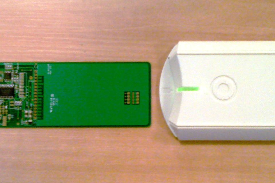 A false smartcard, composed of a circuit board and some logic to emulate a real smartcard.